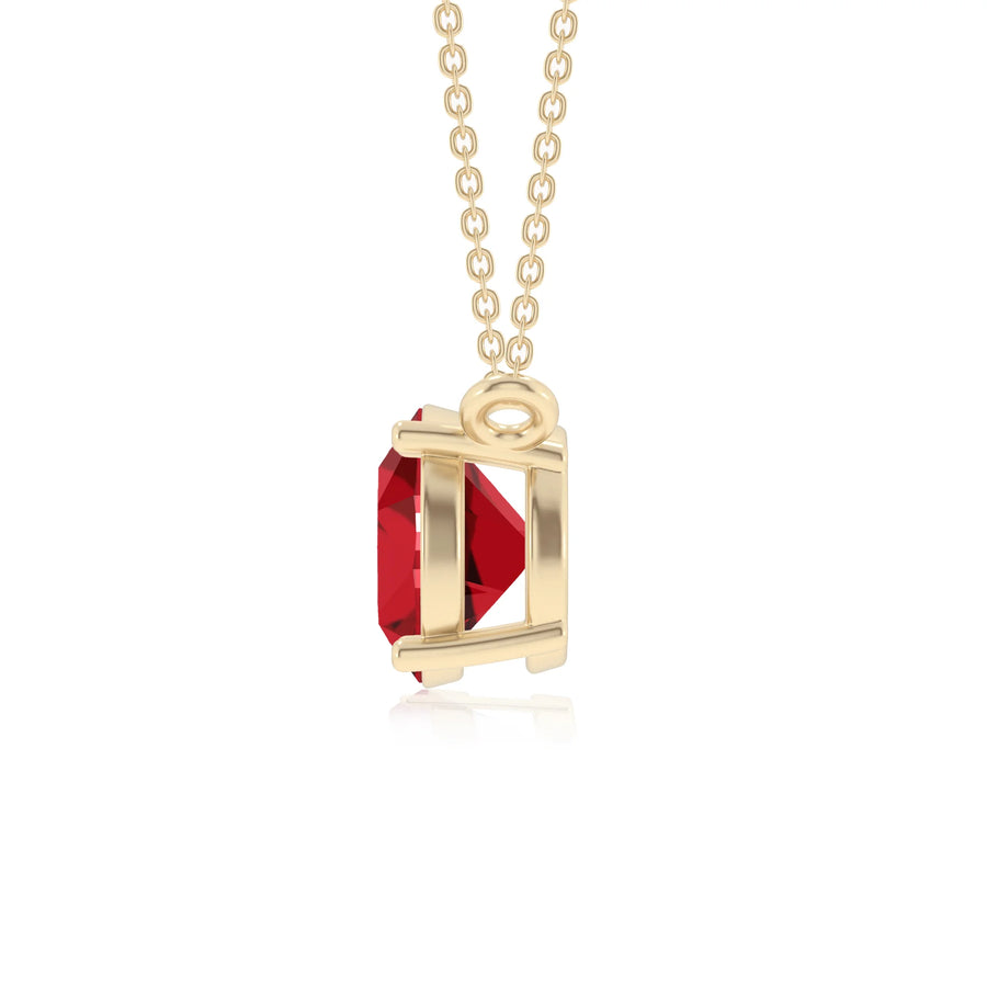 lab grown ruby round solitaire necklaces in yellow gold 