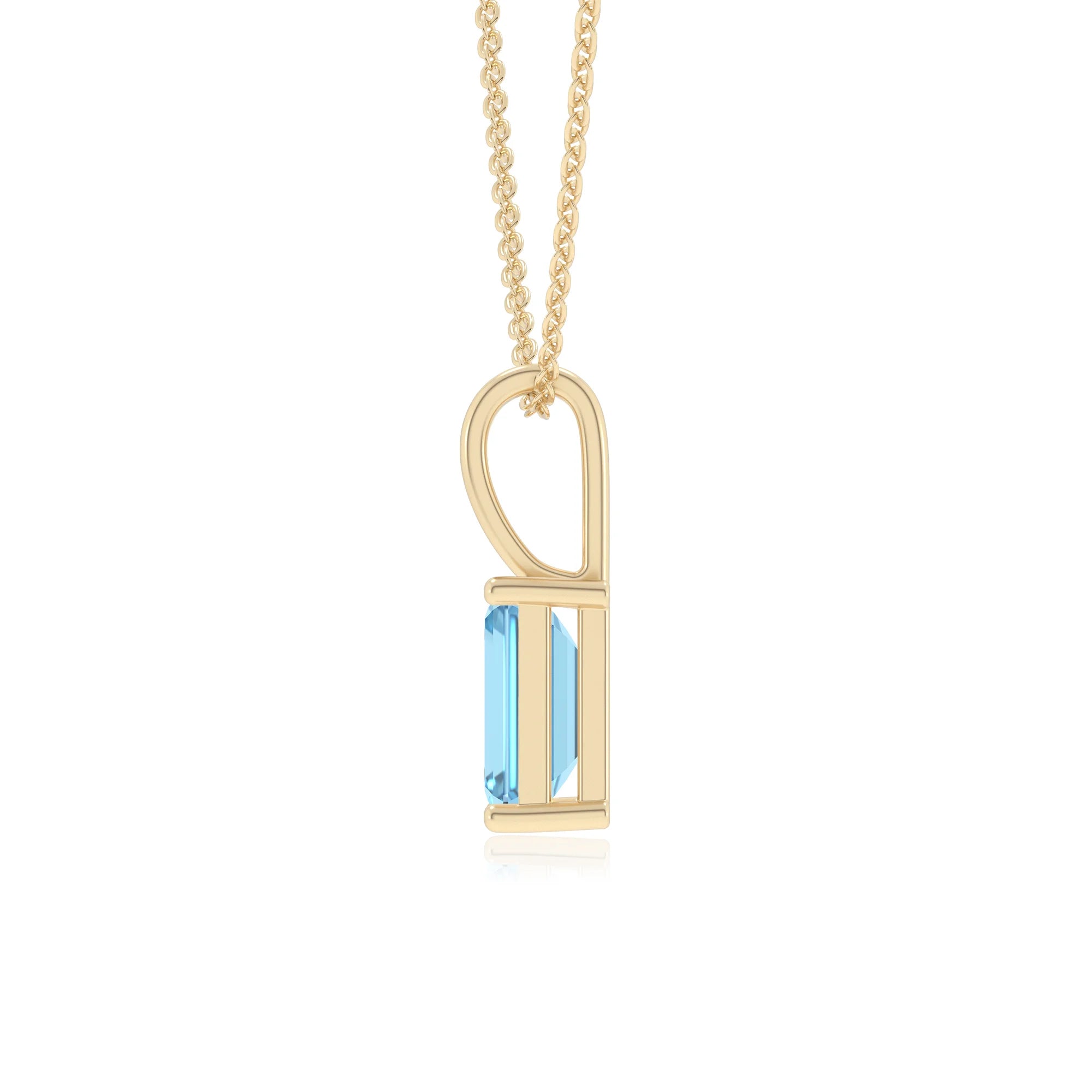 natural swiss-blue-topaz emerald cut solitaire necklaces in yellow gold 