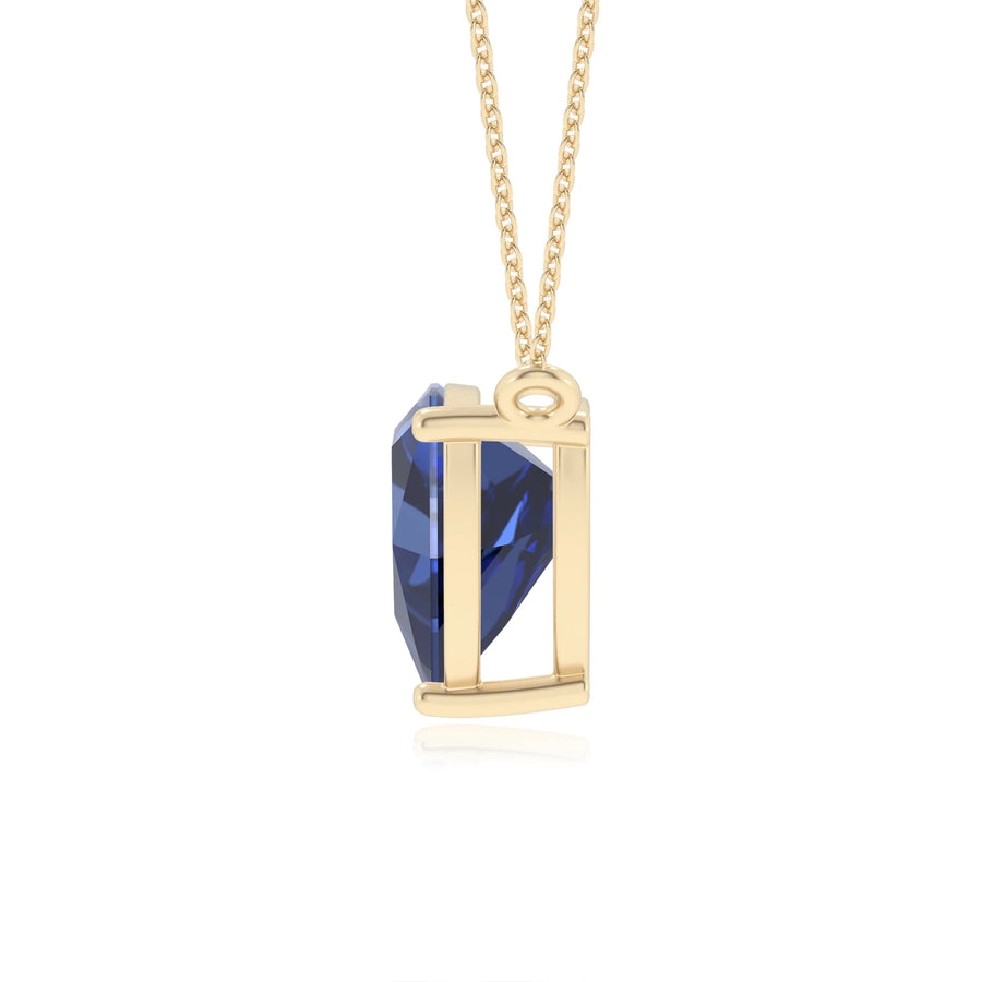 lab grown blue-sapphire trillion solitaire necklaces in yellow gold 
