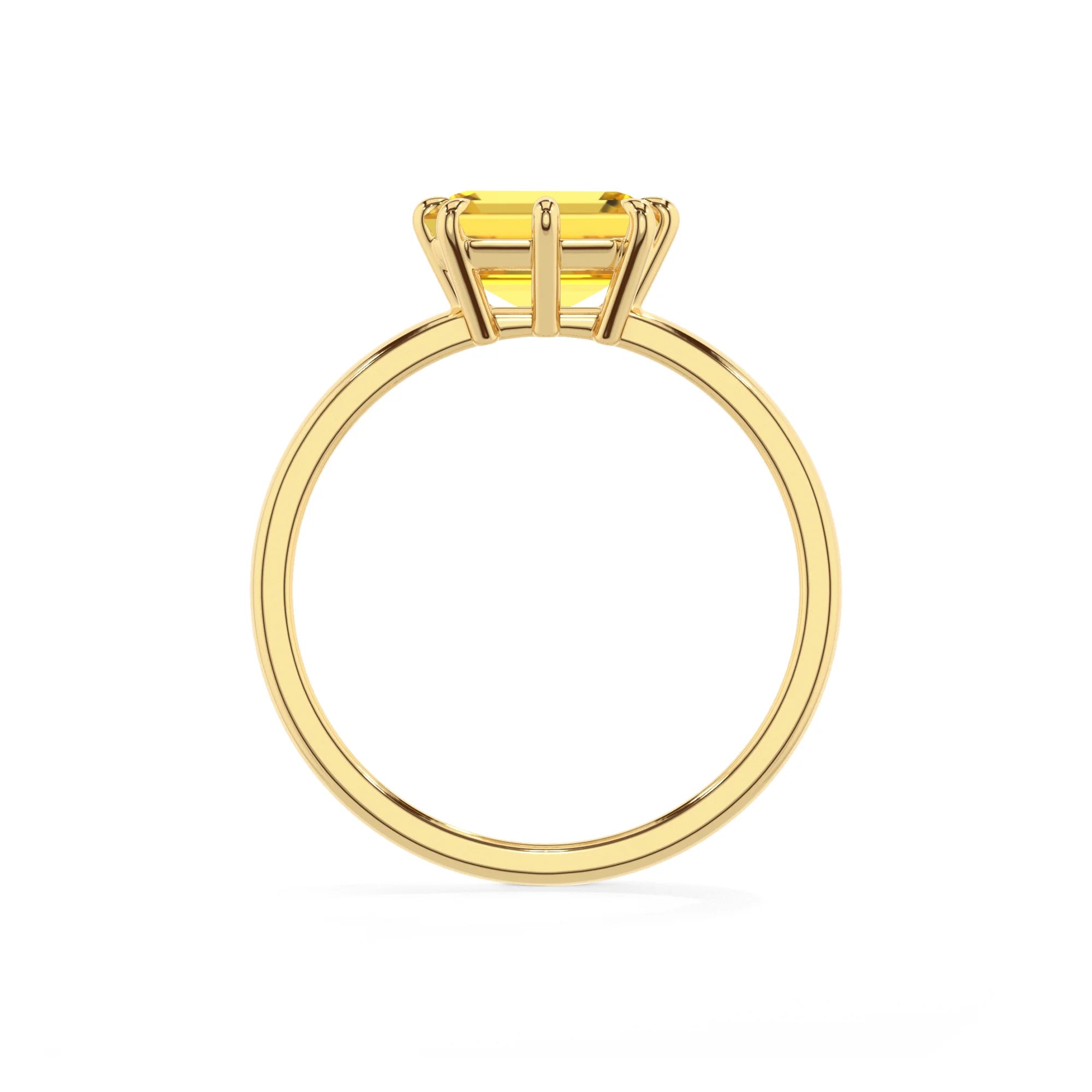 lab grown yellow-sapphire emerald cut solitaire rings in yellow gold 