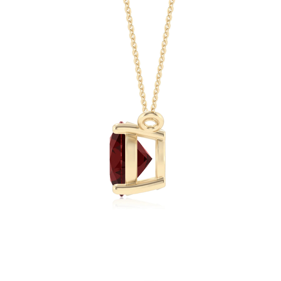 natural garnet oval solitaire necklaces in yellow gold 
