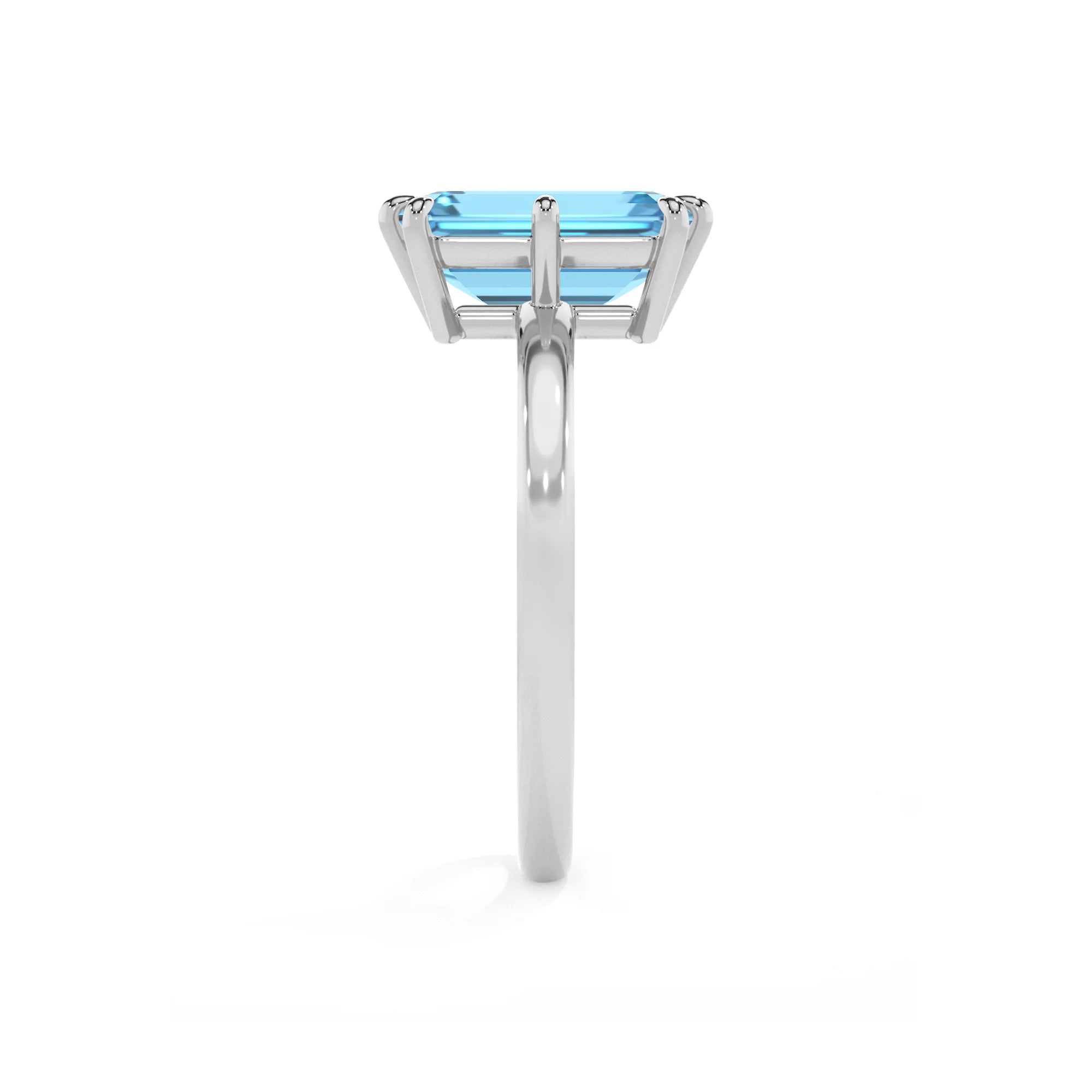 natural swiss-blue-topaz emerald cut solitaire rings in white gold 
