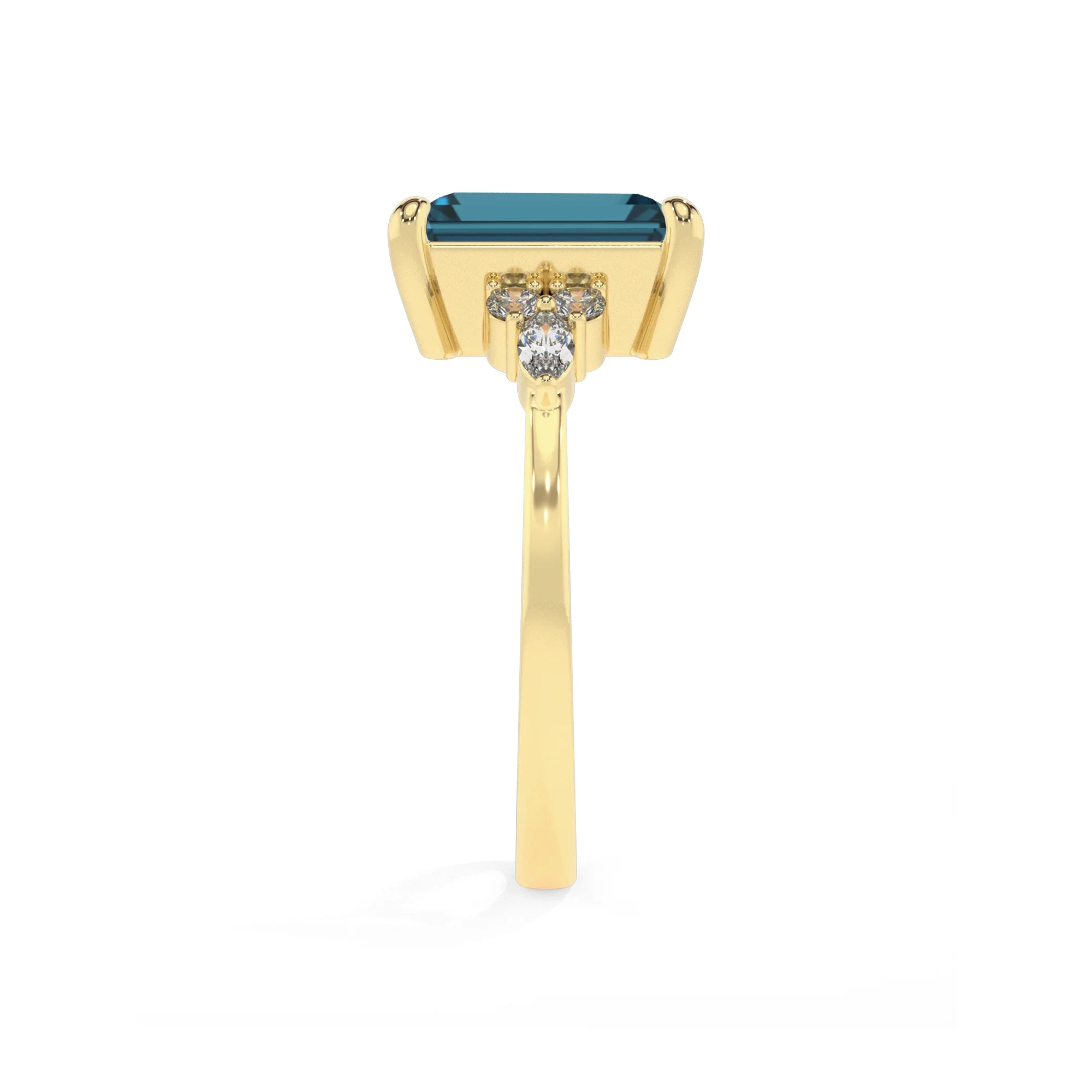 natural london-blue-topaz emerald cut solitaire rings in yellow gold 