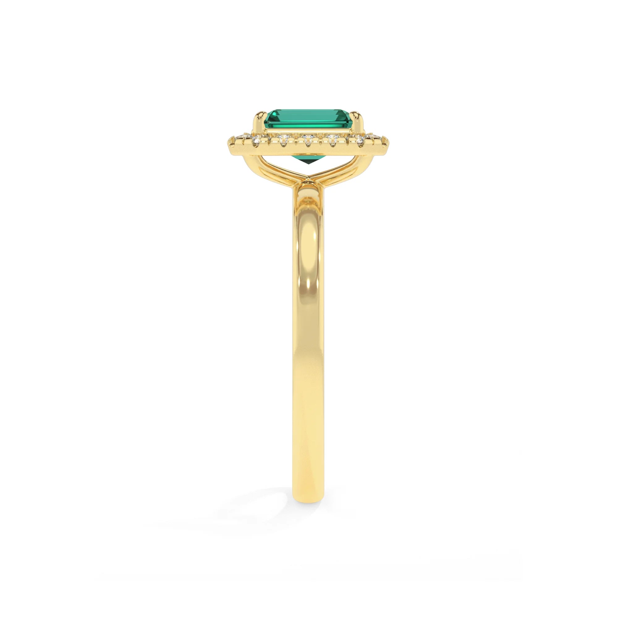 lab grown emerald octogon cut solitaire rings in yellow gold 