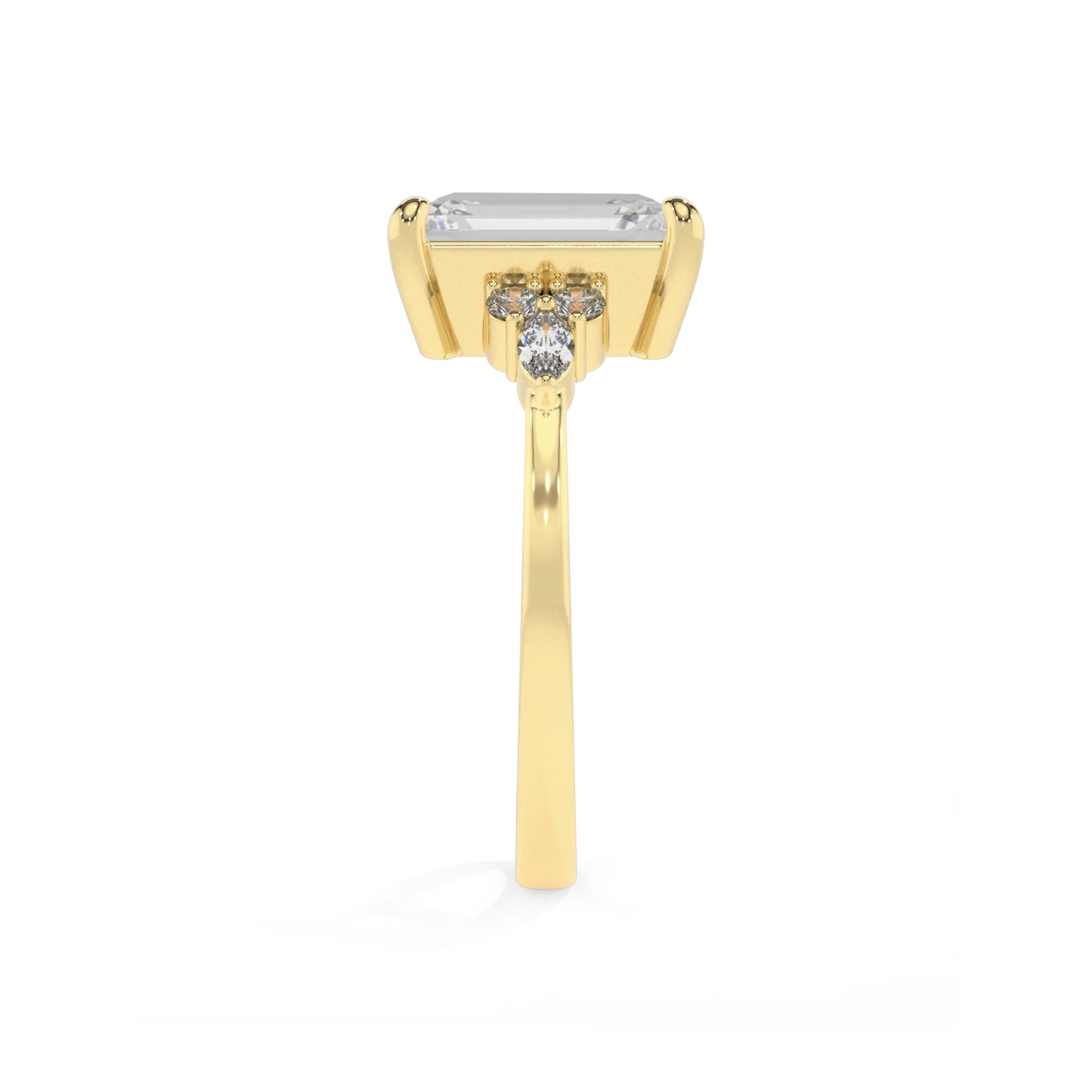 lab grown moissanite emerald cut solitaire rings in yellow gold 