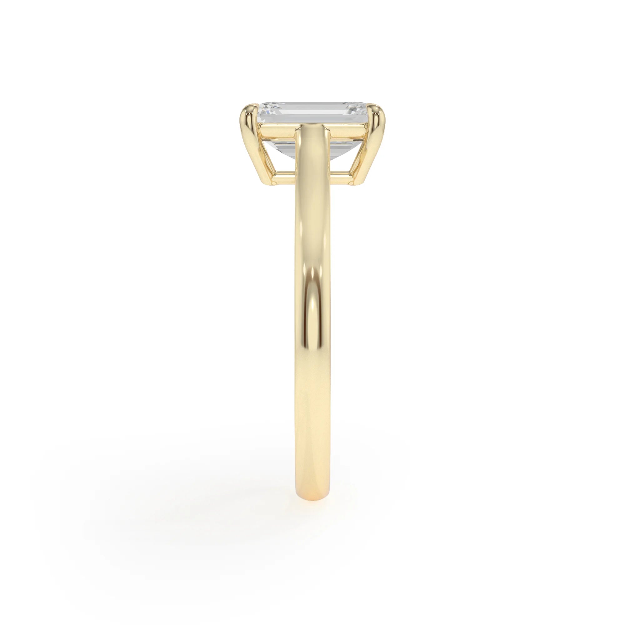 lab grown moissanite emerald cut solitaire rings in yellow gold 