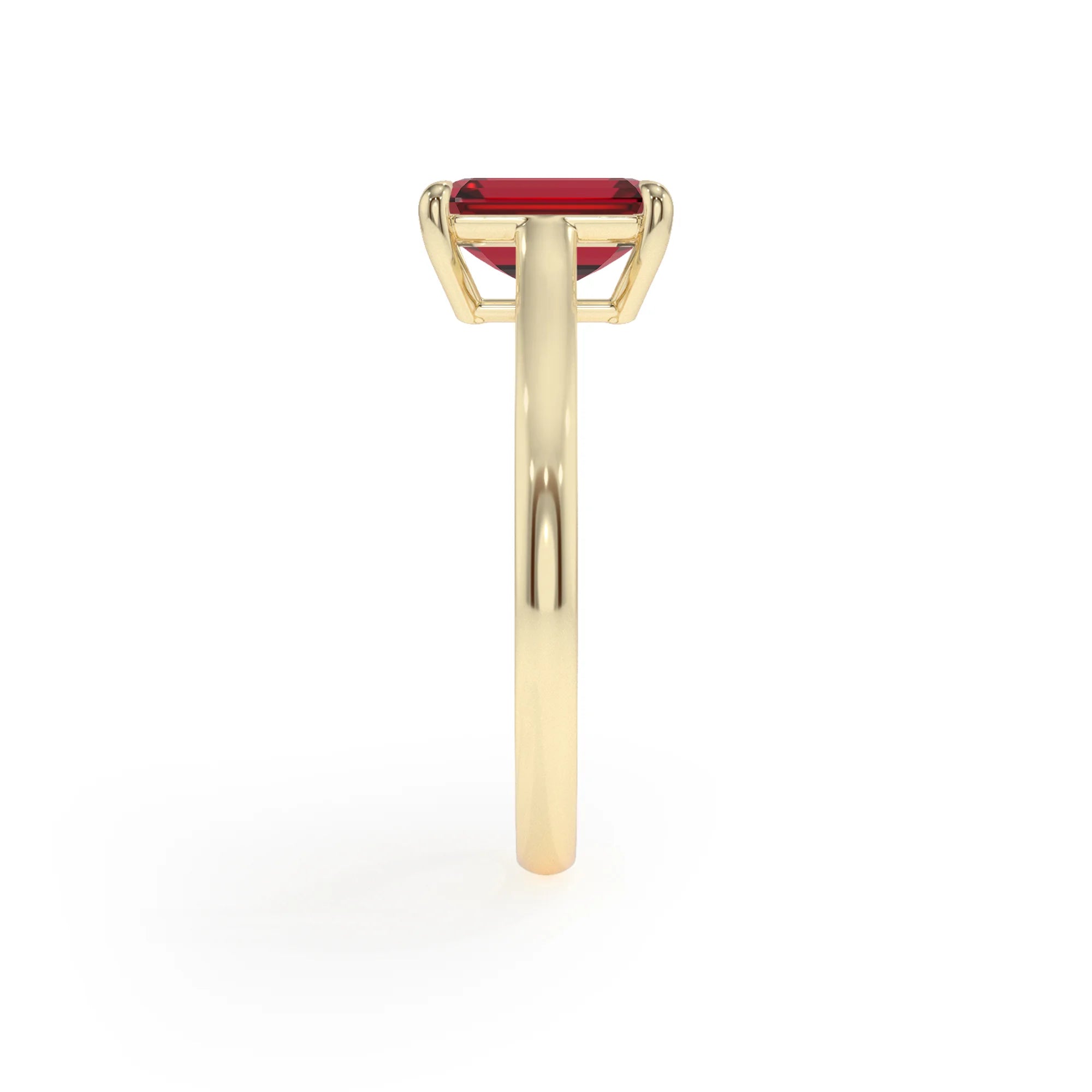lab grown ruby emerald cut solitaire rings in yellow gold 