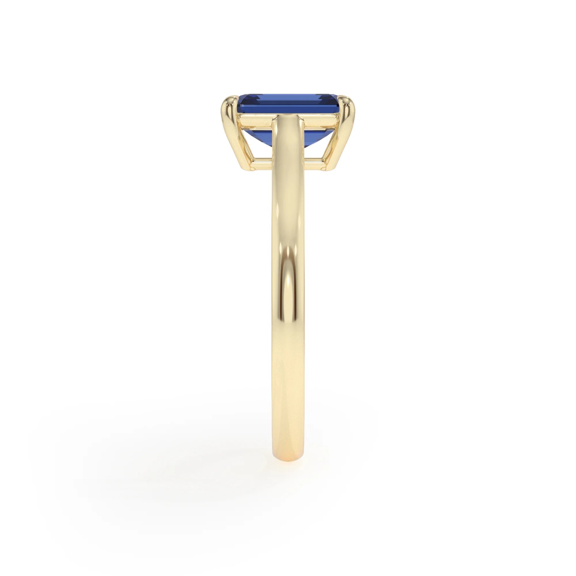 lab grown blue-sapphire emerald cut solitaire rings in yellow gold 