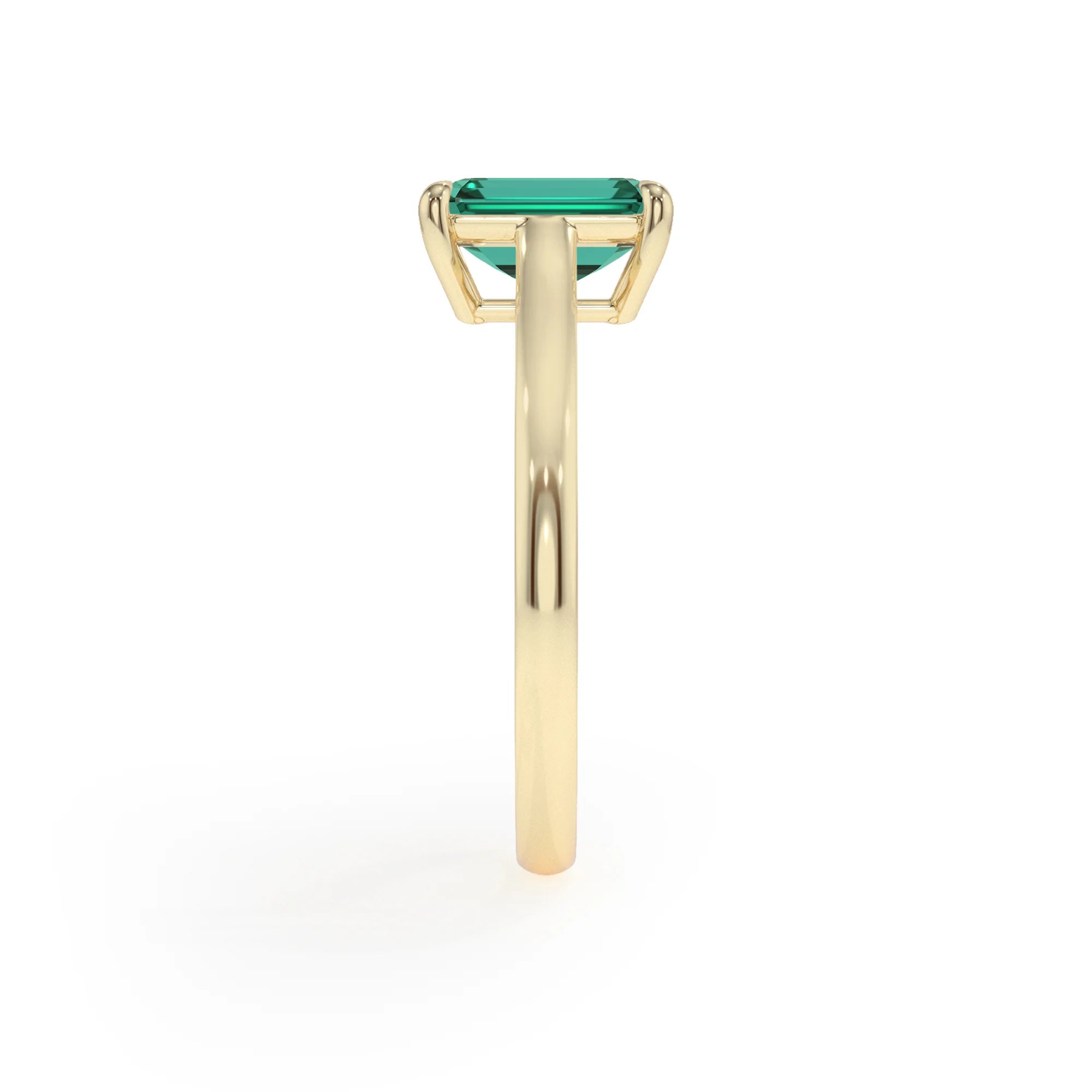 lab grown emerald octogon cut solitaire rings in yellow gold 