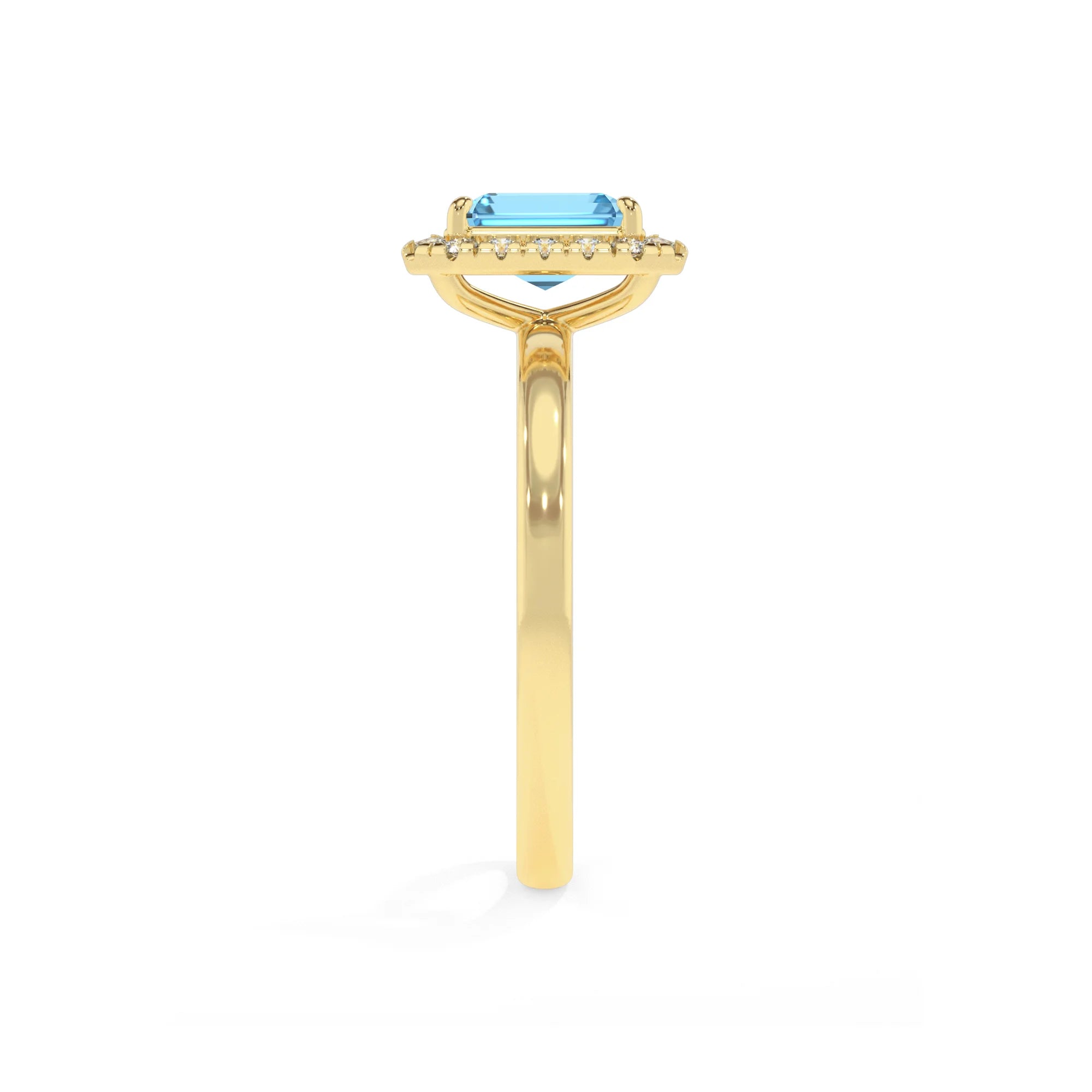 natural swiss-blue-topaz emerald cut solitaire rings in yellow gold 