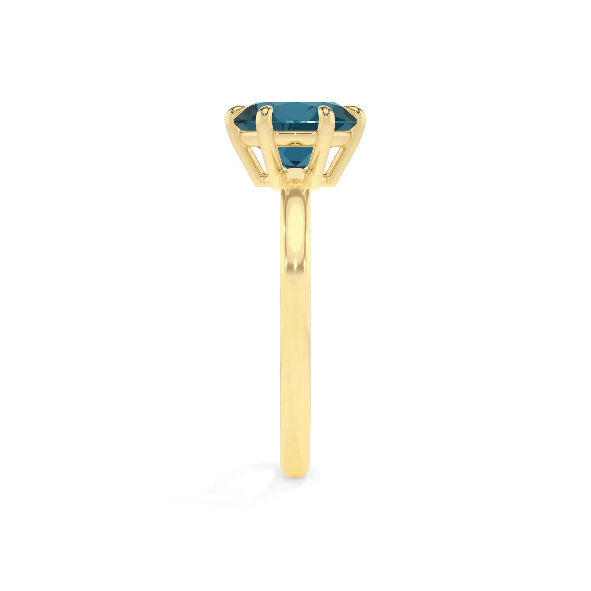 natural london-blue-topaz round solitaire rings in yellow gold 