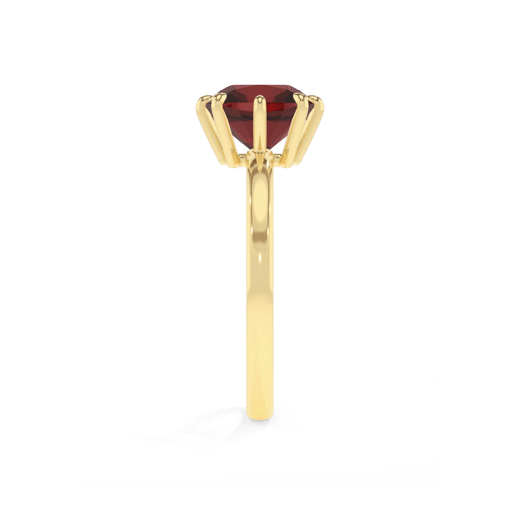 natural garnet cushion solitaire rings in yellow gold 