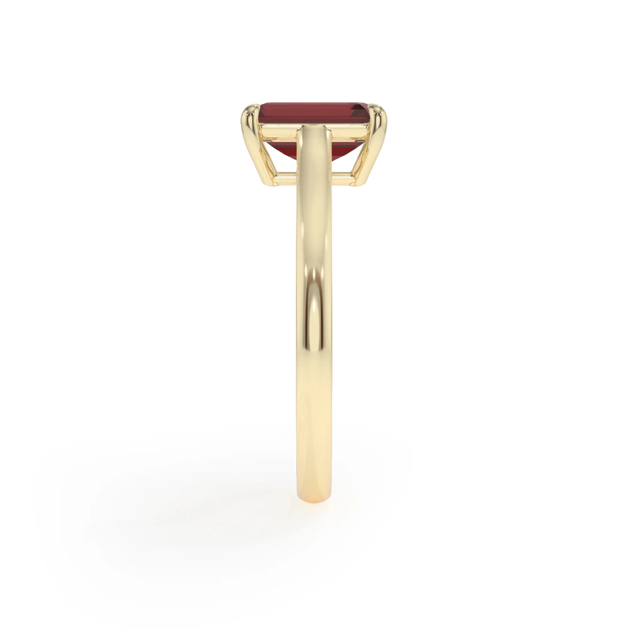 natural garnet emerald cut solitaire rings in yellow gold 