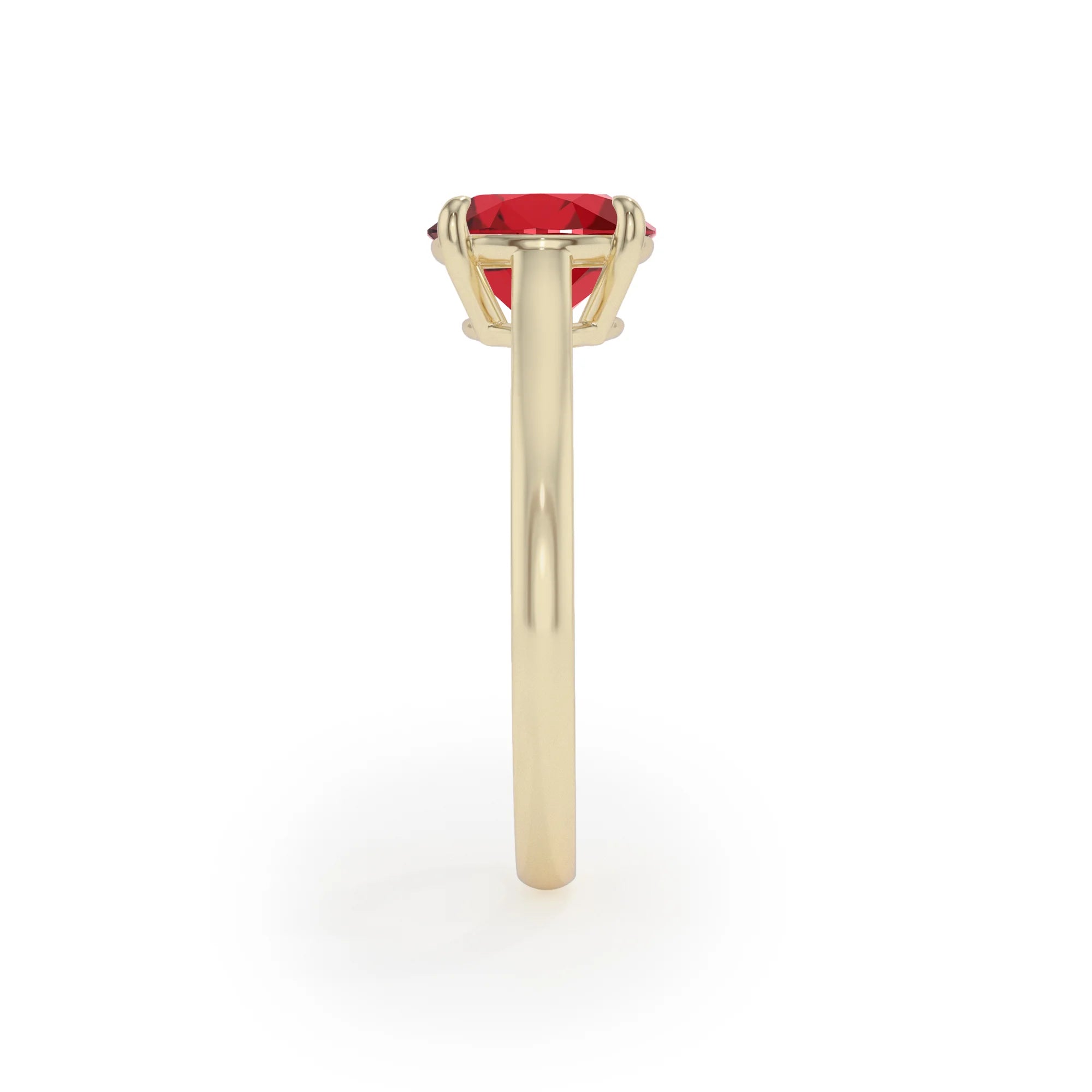 lab grown ruby round solitaire rings in yellow gold 