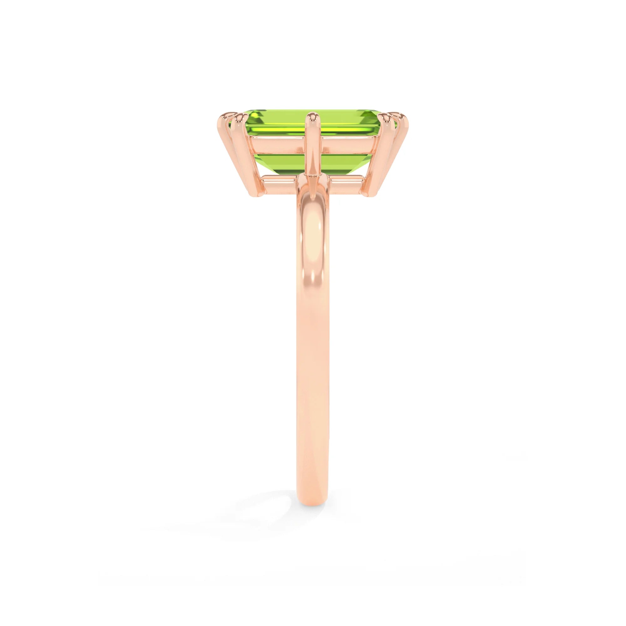 natural peridot emerald cut solitaire rings in rose gold 