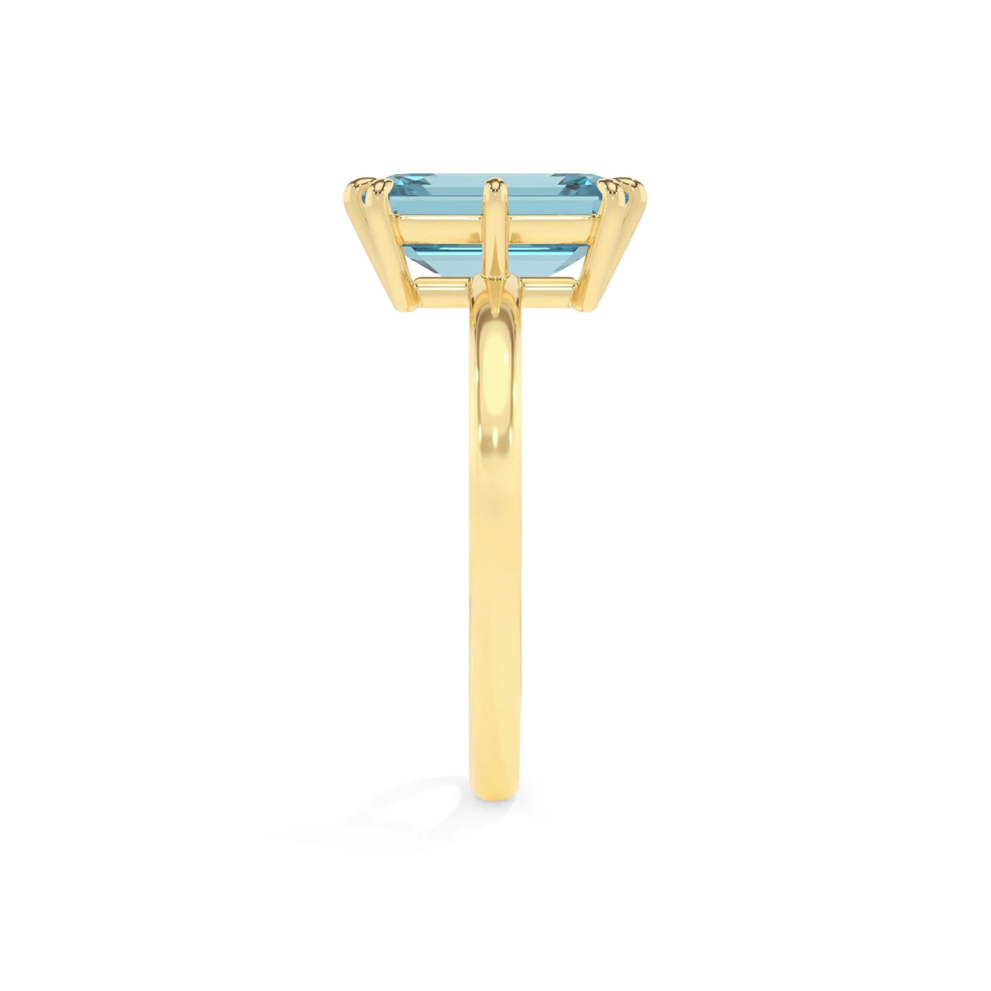 lab grown aquamarine emerald cut solitaire rings in yellow gold 