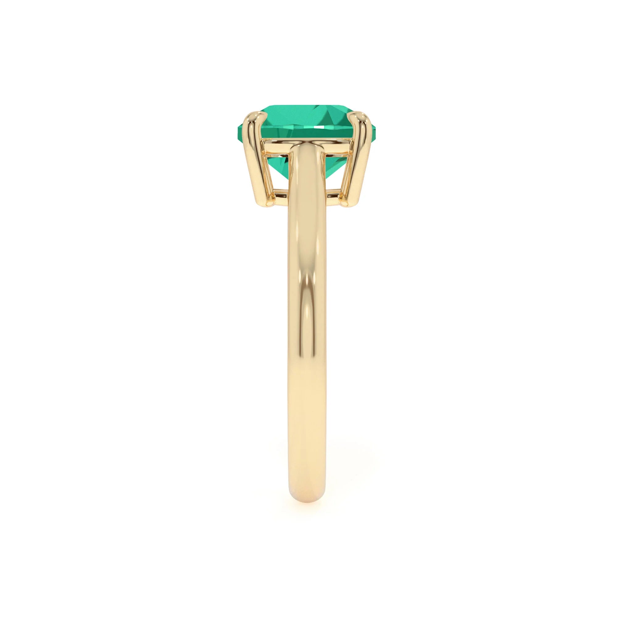 lab grown emerald cushion solitaire rings in yellow gold 